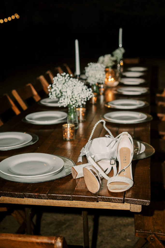 under the oaks, texas wedding venue, wedding rehearsal, texas bride, one more night, shiner texas, oak trees, bistro lights, dinner set up, outdoor dinner set up