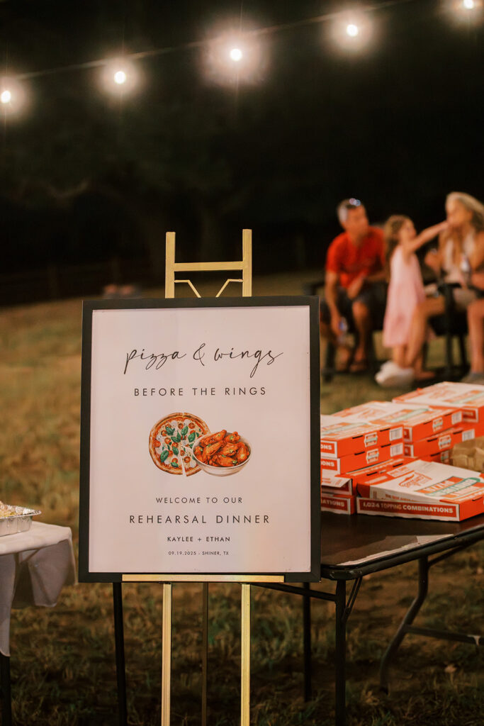 under the oaks, texas wedding venue, wedding rehearsal, texas bride, one more night, shiner texas, oak trees, bistro lights, dinner set up, outdoor dinner set up